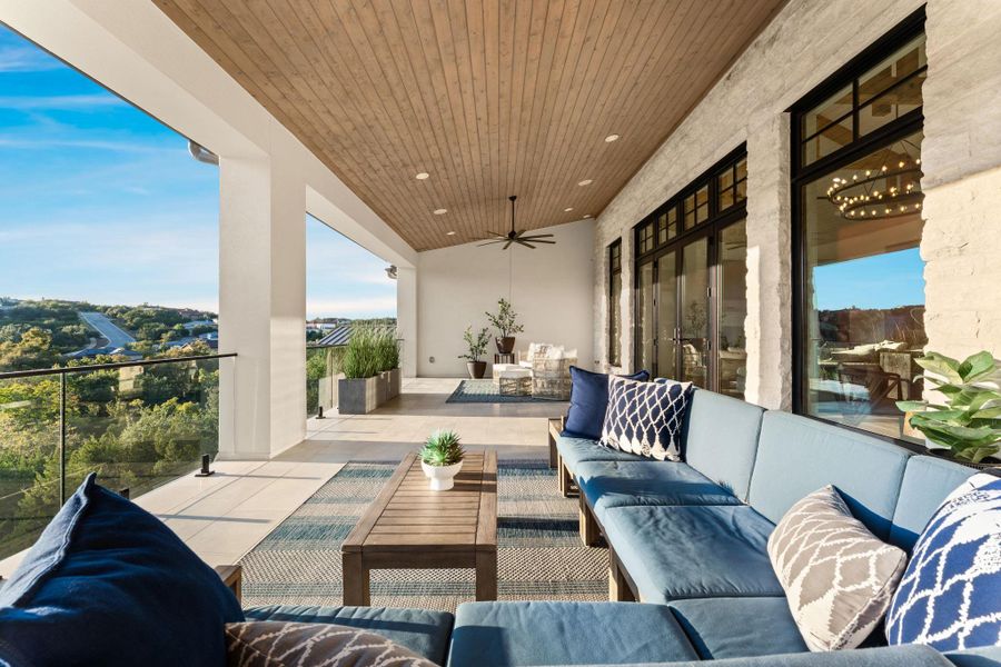 View of patio / terrace with outdoor lounge area and a ceiling fan View of patio / terrace with outdoor lounge area and a ceiling fan