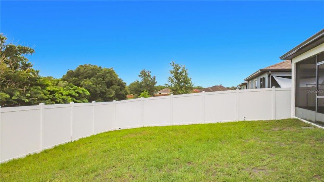 Exterior details and patio area of a home in Lake Alfred Pines, Lake Alfred (Image 3).