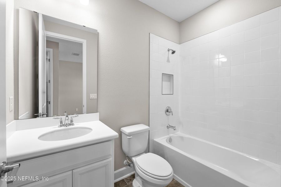 Furnished interior view inside a new home in The Cove at Beachwalk, St. Johns (Image 43). Furnished interior view inside a new home in The Cove at Beachwalk, St. Johns (Image 43).