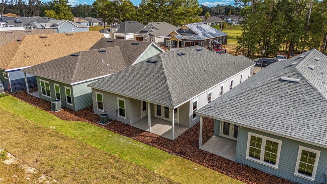 Front exterior of a new home in Fairway Pointe at West End, Newberry, FL, highlighting curb appeal (Image 28).