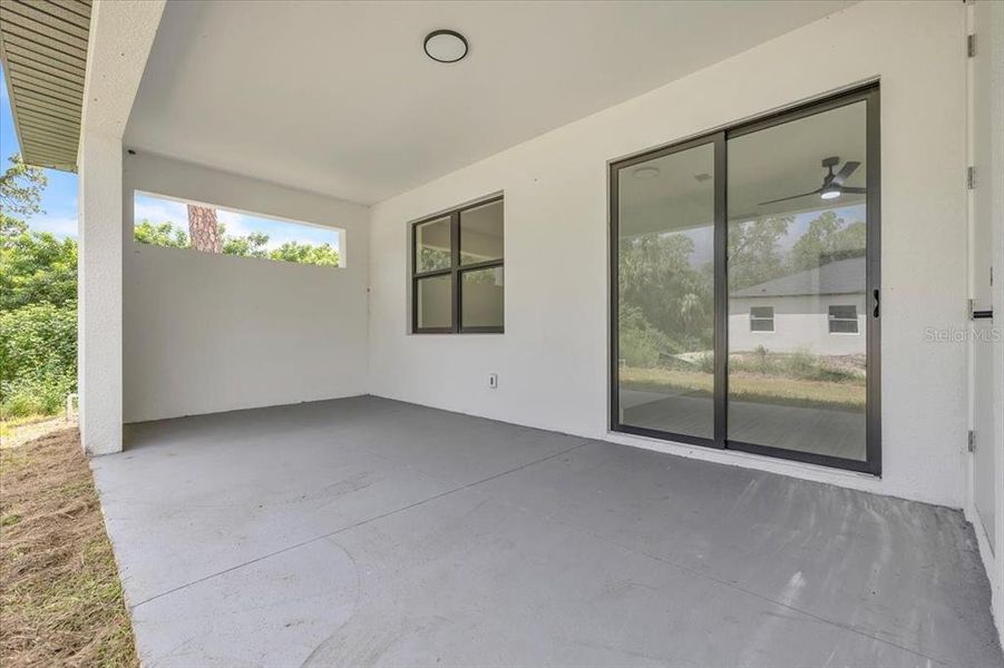 Exterior details and patio area of a home in , Port Charlotte (Image 3).
