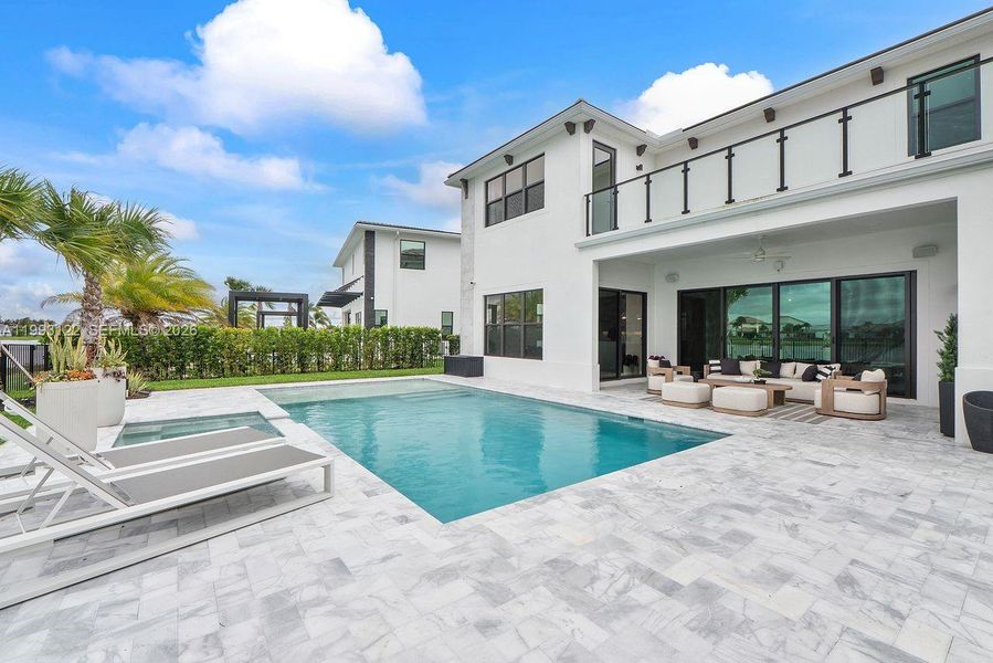 Exterior details and patio area of a home in Solana Bay at Avenir, Palm Beach Gardens (Image 29).