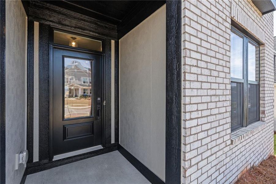 Exterior details and patio area of a home in Twin Lakes, Hoschton (Image 31).