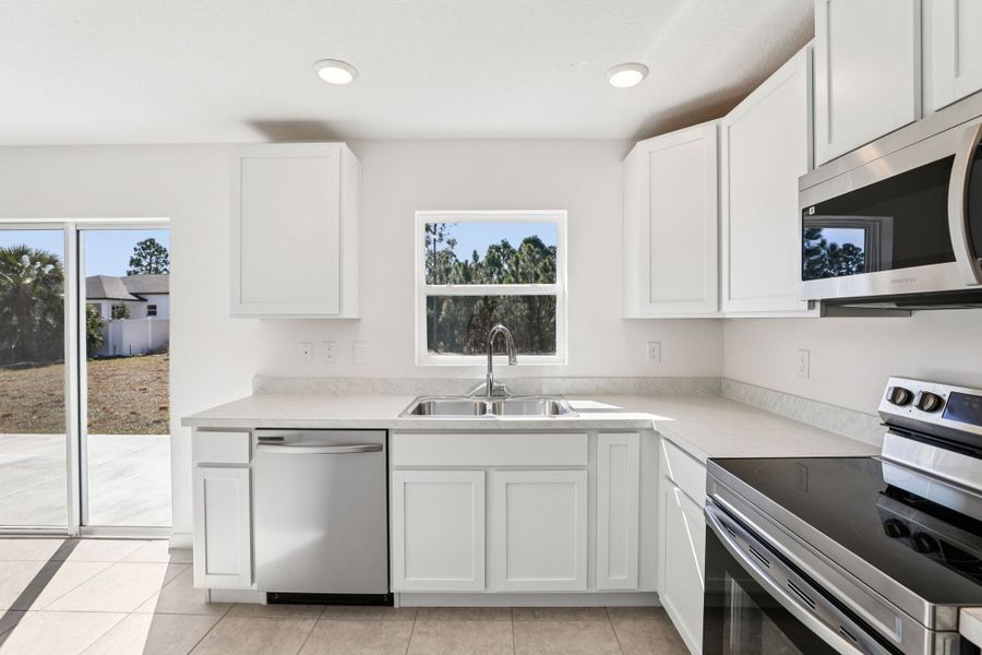 Representative furnished interior of a home built from the Poinsettia by Maronda Homes in Cape Coral, Cape Coral (Image 15).