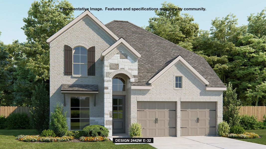 French country style house with driveway, stone siding, and brick siding French country style house with driveway, stone siding, and brick siding