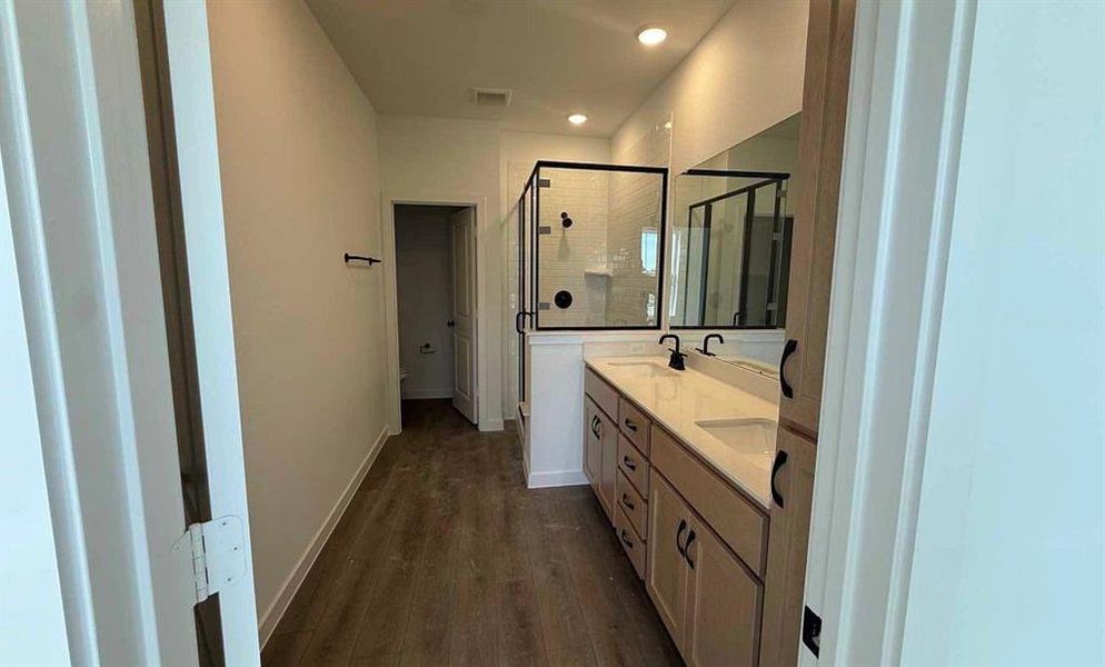 Furnished interior view inside a new home in Collin Creek, Plano (Image 7).