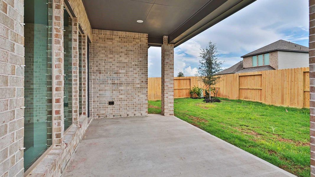 Exterior details and patio area of a home in Valencia, Manvel (Image 4). Exterior details and patio area of a home in Valencia, Manvel (Image 4).