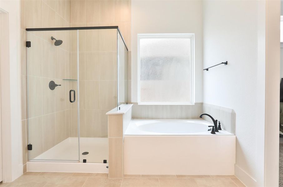 Separate soaking tub and walk-in shower for added comfort and relaxation. Separate soaking tub and walk-in shower for added comfort and relaxation.