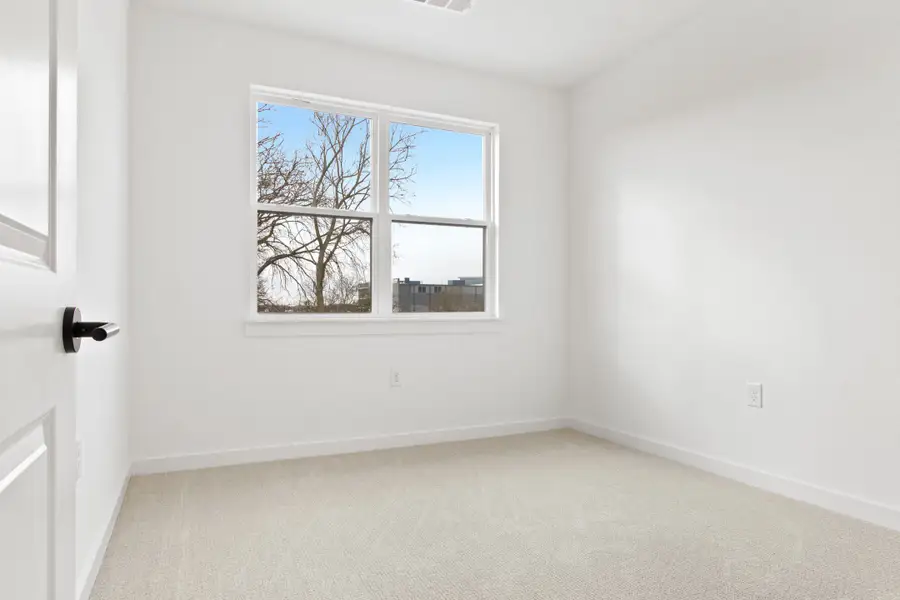 Spacious, unfurnished interior of a new home in Willow Grove Townhomes, Melissa (Image 15).
