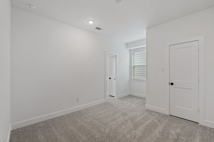 Spacious, unfurnished interior of a new home in Meridiana, Manvel (Image 40).