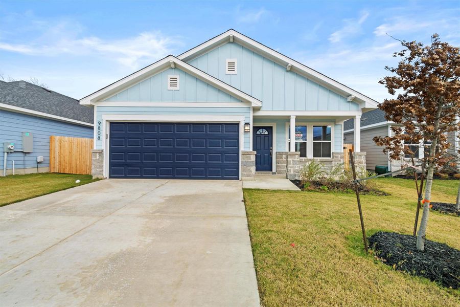 Front exterior of a new home in Butler Farms, Liberty Hill, TX, highlighting curb appeal (Image 1). Front exterior of a new home in Butler Farms, Liberty Hill, TX, highlighting curb appeal (Image 1).
