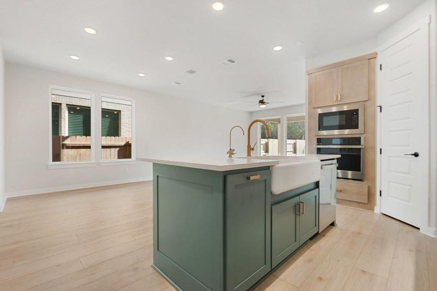 Furnished interior view inside a new home in Terrace Collection at Lariat, Liberty Hill (Image 8). Furnished interior view inside a new home in Terrace Collection at Lariat, Liberty Hill (Image 8).