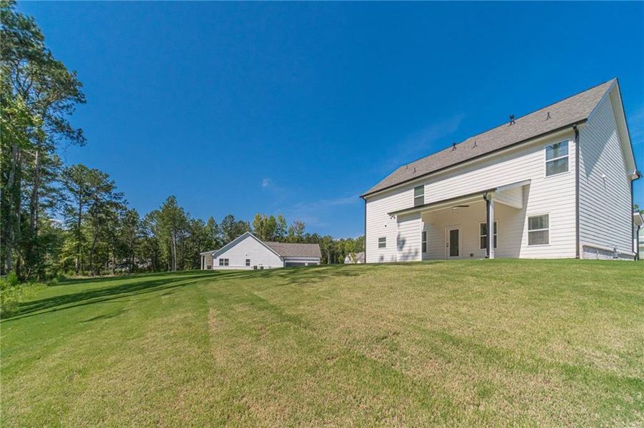 Exterior details and patio area of a home in , Loganville (Image 35).