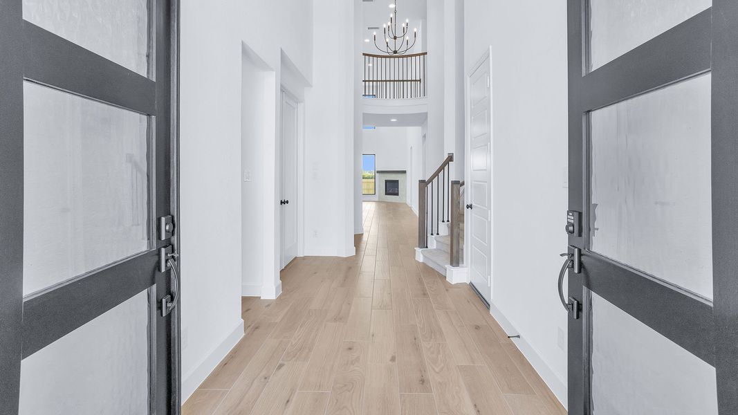 Spacious, unfurnished interior of a new home in Lakes of Cane Island, Katy (Image 18).