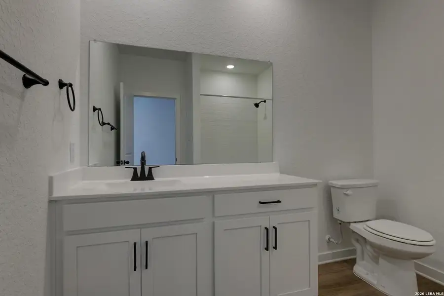 Furnished interior view inside a new home in Nopal Valley, San Antonio (Image 11).