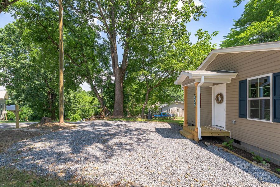 Front exterior of a new home in , Marion, NC, highlighting curb appeal (Image 2).
