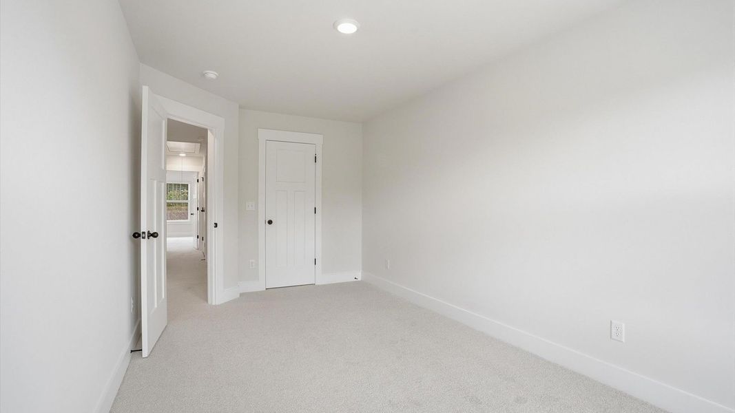 First-rate secondary bedroom with a spacious walk-in closet and elegant carpeted flooring located in Greenville, SC First-rate secondary bedroom with a spacious walk-in closet and elegant carpeted flooring located in Greenville, SC