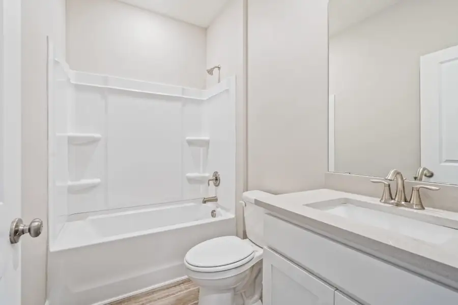 Furnished interior view inside a new home in Natureview, Freeport (Image 5).