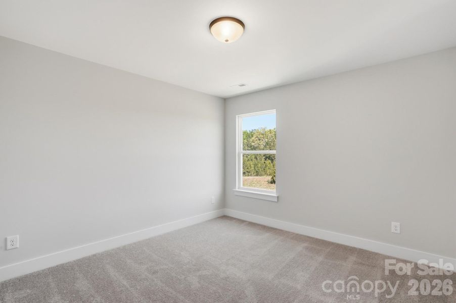 Spacious, unfurnished interior of a new home in Blythe Mill Townhomes, Waxhaw (Image 44).
