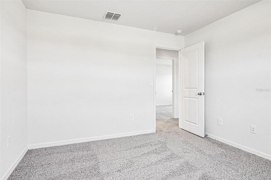 Spacious, unfurnished interior of a new home in Two Rivers - Classic Series, Zephyrhills (Image 13).