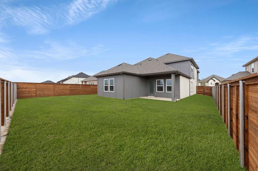 Exterior details and patio area of a home in Solterra, Mesquite (Image 30).