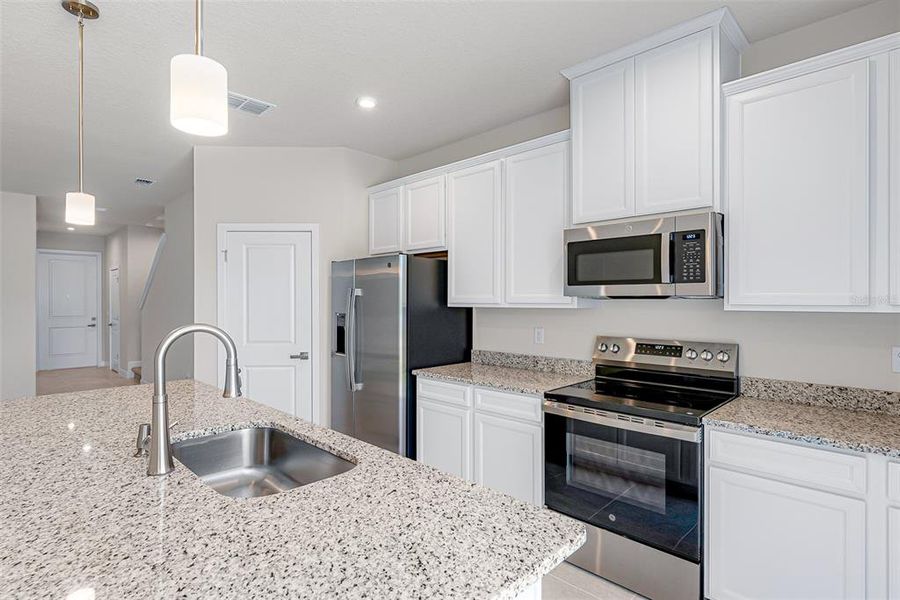 Furnished interior view inside a new home in Kendall Pointe, Melbourne (Image 3).