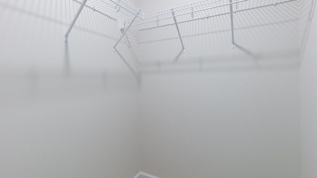 Spacious, unfurnished interior of a new home in The Estates at Edinborough, Gibsonville (Image 30).