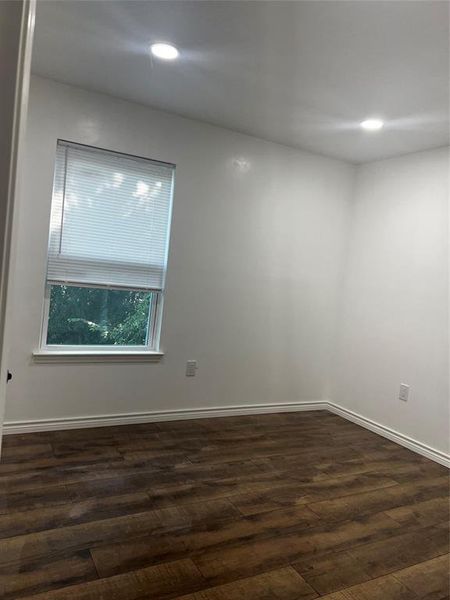 Unfurnished room with wood-type flooring