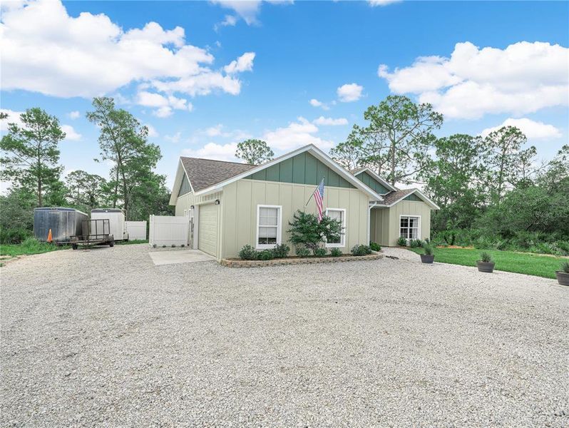 Front exterior of a new home in , Sebring, FL, highlighting curb appeal (Image 21).