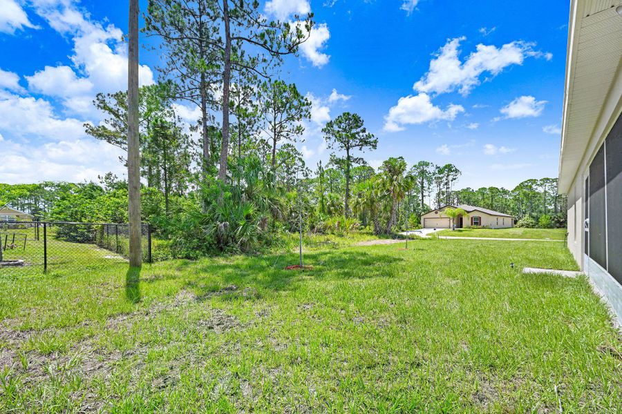 Exterior details and patio area of a home in Palm Bay & South Brevard, Palm Bay (Image 4).