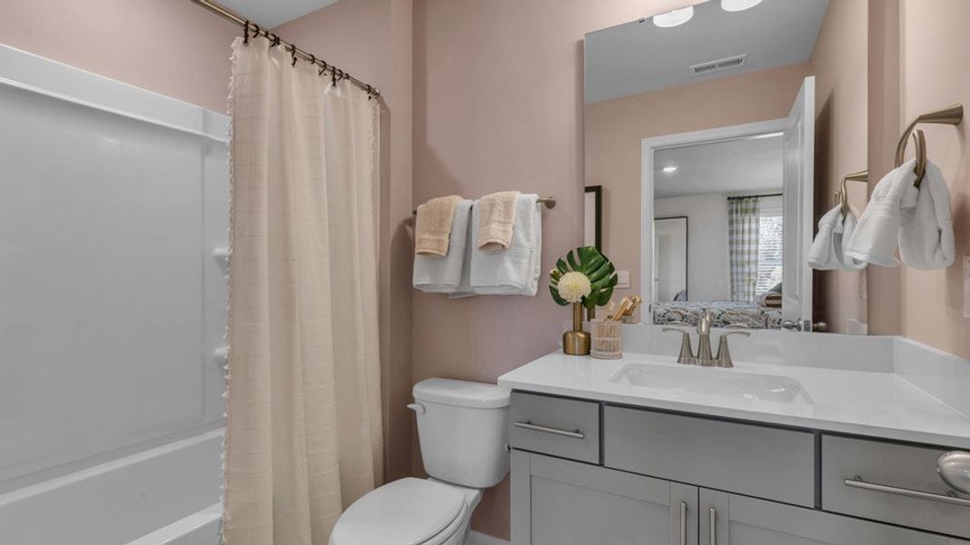 Representative furnished interior of a home built from the HARTWELL by D.R. Horton in Eagle Creek, Fuquay Varina (Image 6).