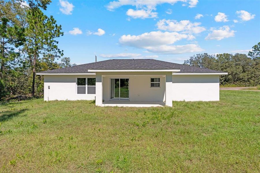 Exterior details and patio area of a home in , Ocklawaha (Image 3).