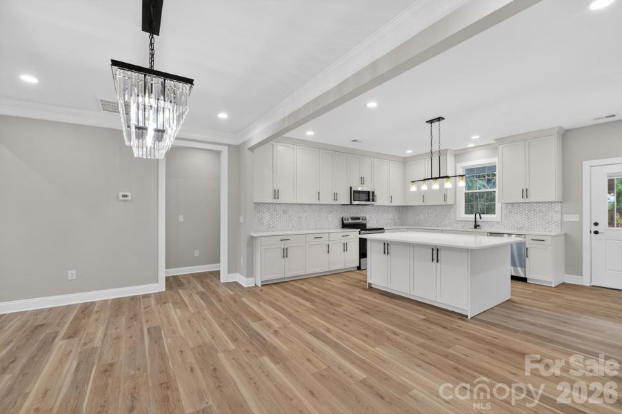 Furnished interior view inside a new home in , Lenoir (Image 31).