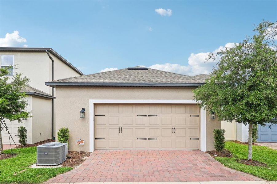 Front exterior of a new home in , Winter Garden, FL, highlighting curb appeal (Image 22). Front exterior of a new home in , Winter Garden, FL, highlighting curb appeal (Image 22).