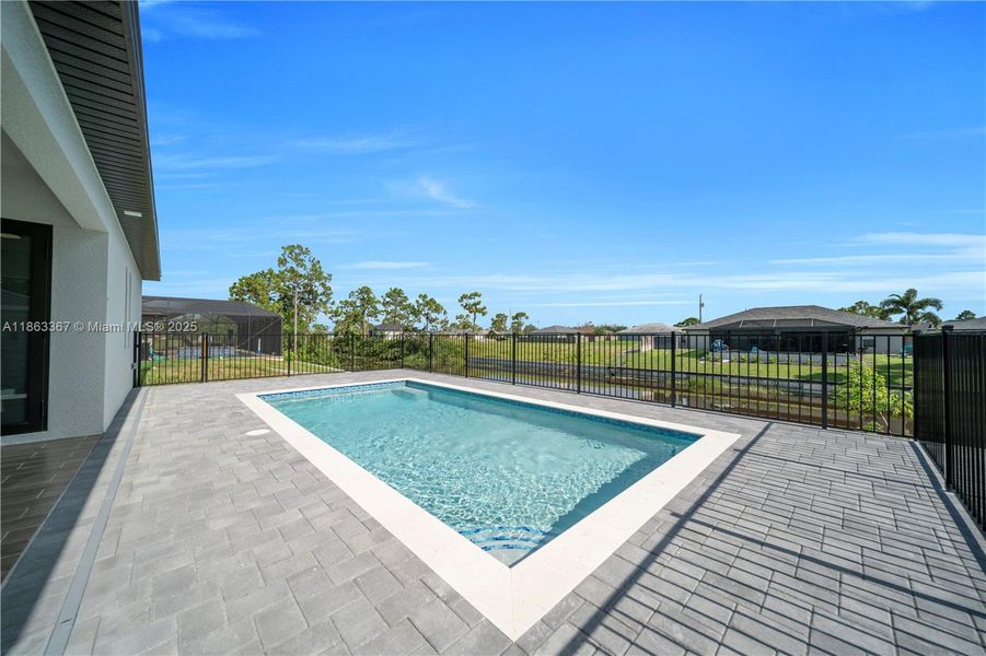 Front exterior of a new home in , Cape Coral, FL, highlighting curb appeal (Image 1).