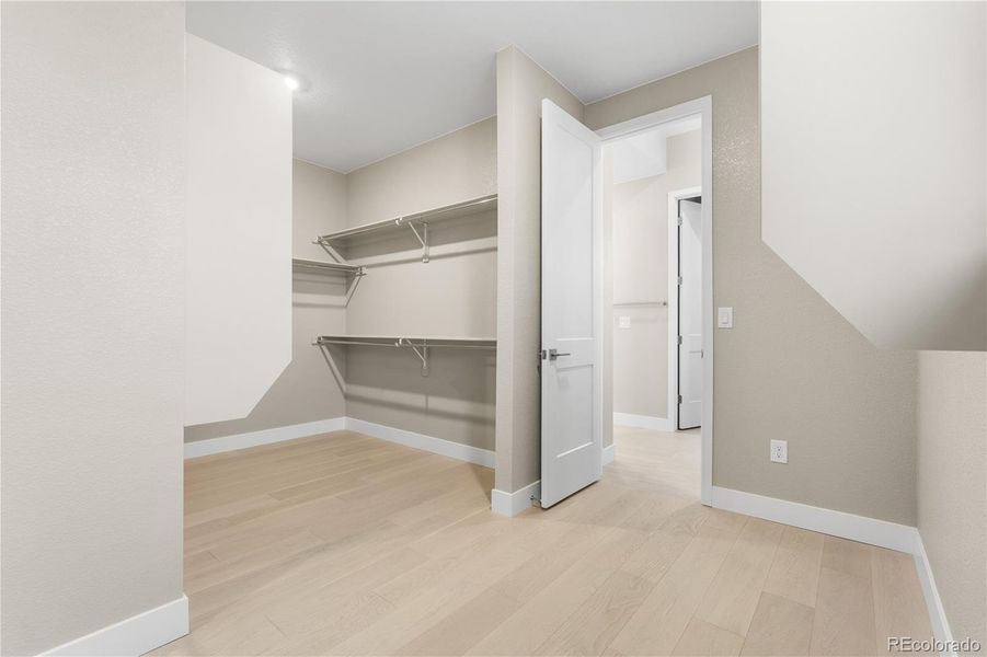 Spacious, unfurnished interior of a new home in Autograph at Lyric, Lone Tree (Image 43).