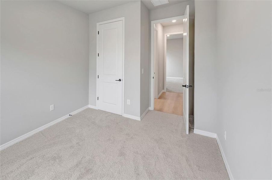 Spacious, unfurnished interior of a new home in Waterset Tradition Series, Apollo Beach (Image 9).