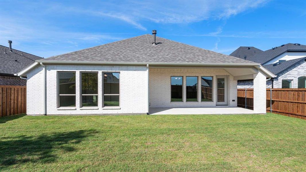 Exterior details and patio area of a home in Trinity Falls 50', McKinney (Image 4).