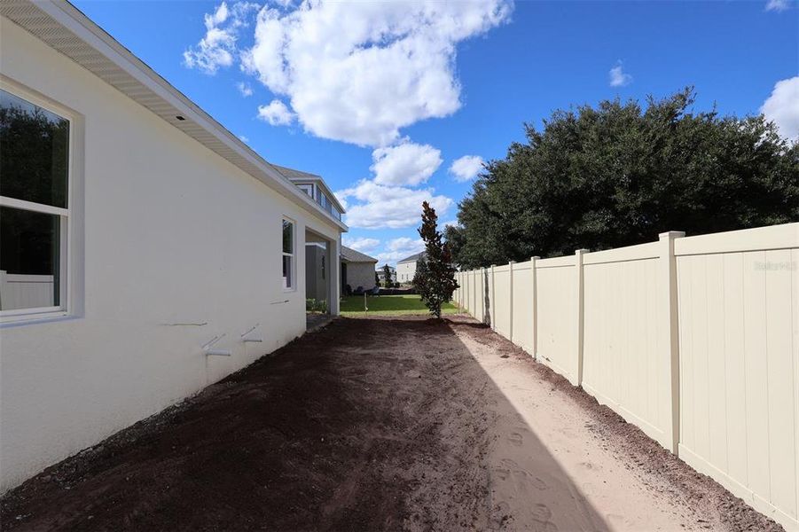Exterior details and patio area of a home in Bay Lake Farms, St. Cloud (Image 3).