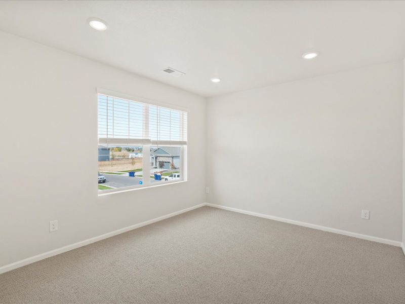 Spacious, unfurnished interior of a new home in Buffalo Highlands: The Flora Collection, Commerce City (Image 17).