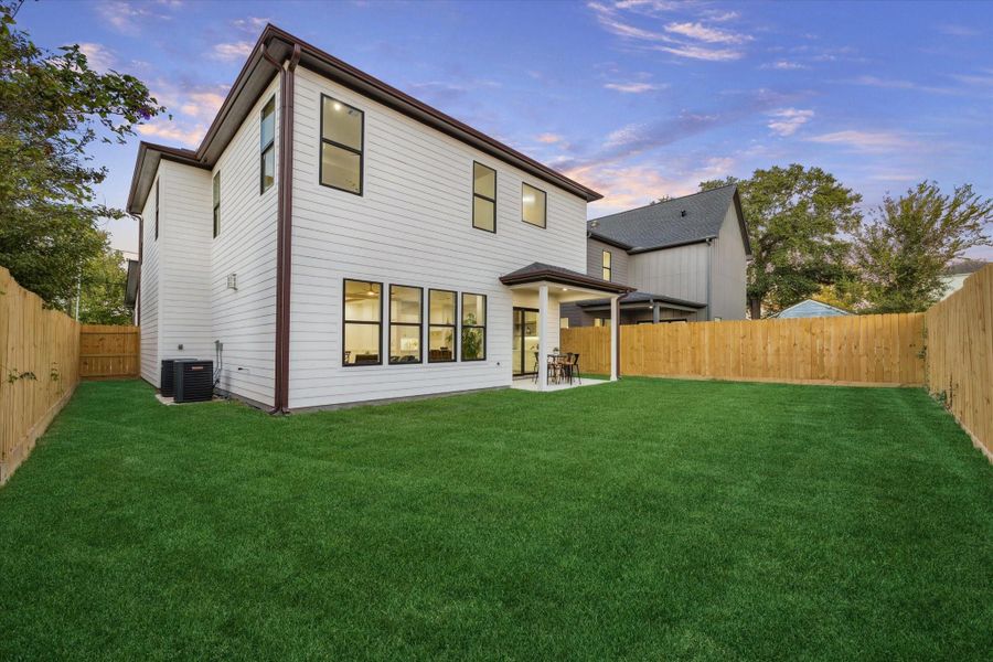 Exterior details and patio area of a home in , Houston (Image 4).