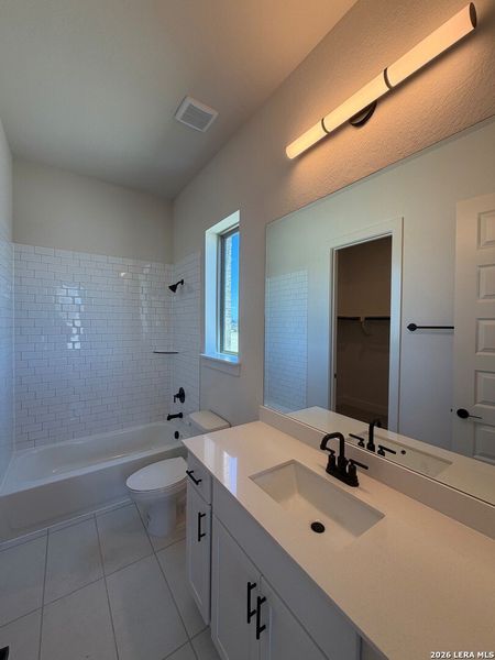 Furnished interior view inside a new home in Ladera - 50s, San Antonio (Image 7).