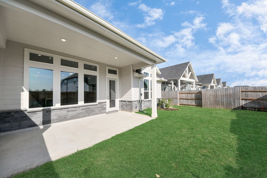 Exterior details and patio area of a home in Elyson, Katy (Image 3).