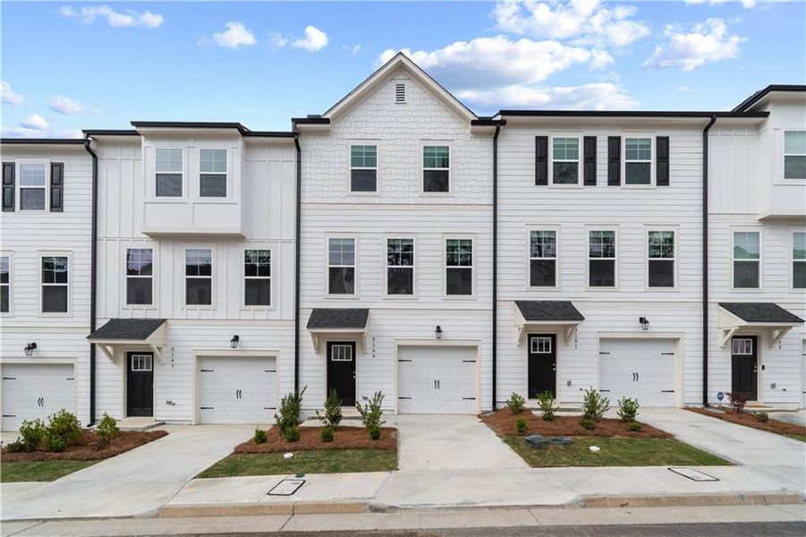 Front exterior of a new home in Monticello, Atlanta, GA, highlighting curb appeal (Image 2). Front exterior of a new home in Monticello, Atlanta, GA, highlighting curb appeal (Image 2).