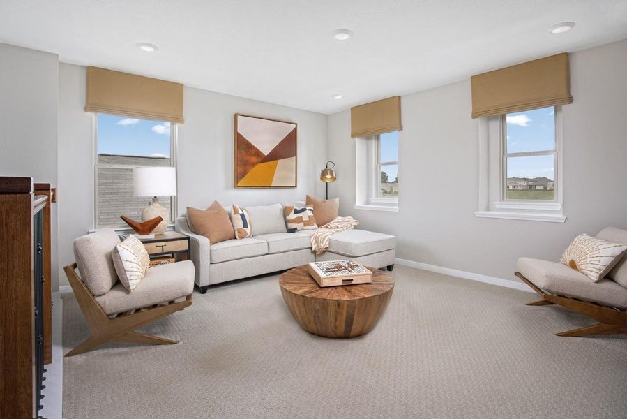 Perfect for entertaining is this amazing game room! Right upstairs, this space would be a fabulous teen hangout, media room, or adult game room! Featuring plush carpet, high ceilings, recessed lighting, custom paint and large windows!