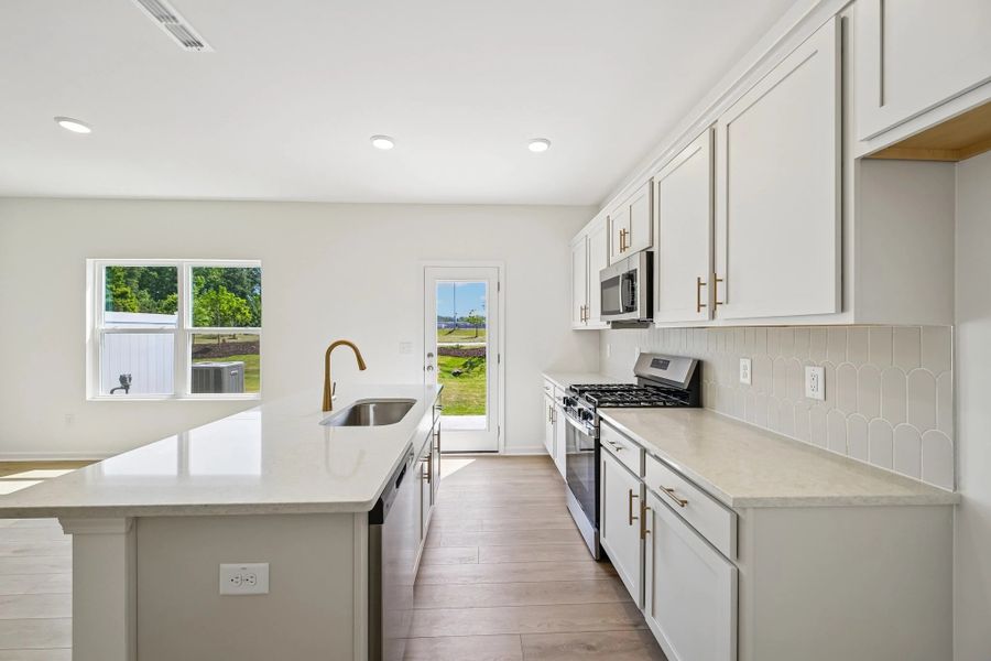 Furnished interior view inside a new home in Towns at The Point, Rolesville (Image 5). Furnished interior view inside a new home in Towns at The Point, Rolesville (Image 5).