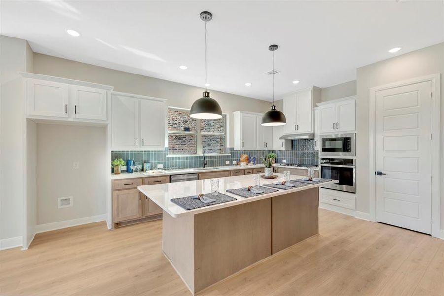 Furnished interior view inside a new home in South Pointe  Cottage Series, Mansfield (Image 7).