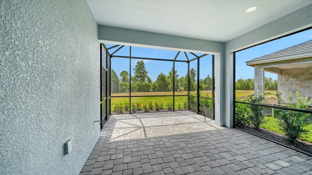 Exterior details and patio area of a home in Palm Grove, Lakewood Ranch (Image 20).