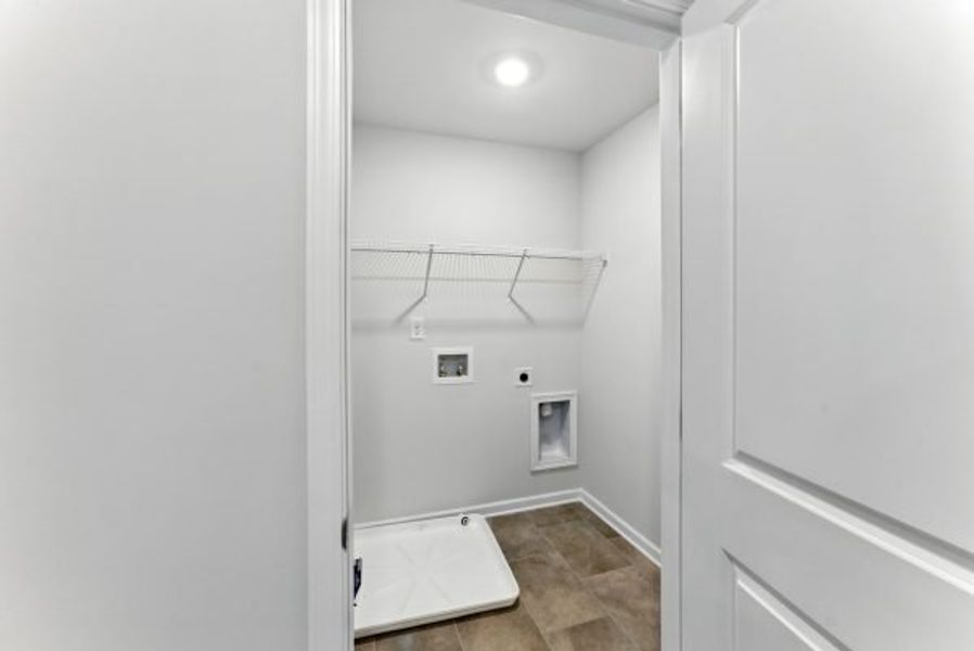 Representative unfurnished interior of a home built from the Brentwood by Piedmont Residential in Falls Creek, Flowery Branch (Image 28).