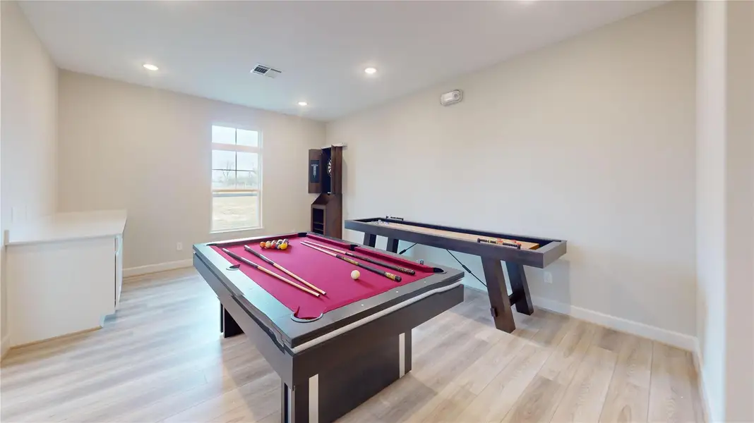 Enjoy friendly competition in the clubhouse game room, featuring billiards, shuffleboard, and darts – the perfect place to unwind and connect with neighbors.